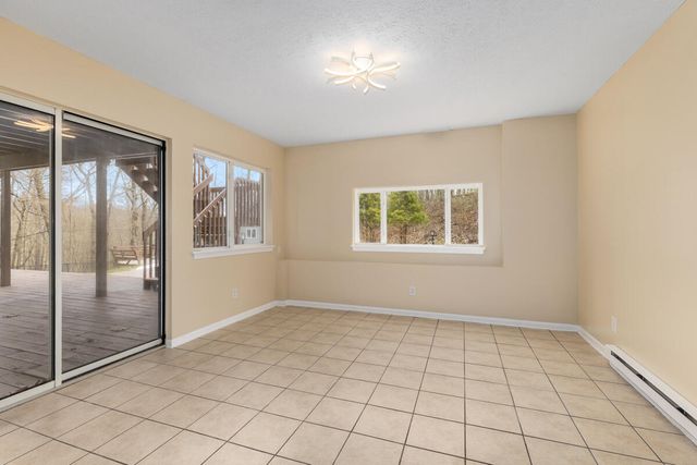 7721 Sun Quest Ridge Drive, Ada, MI 49301
