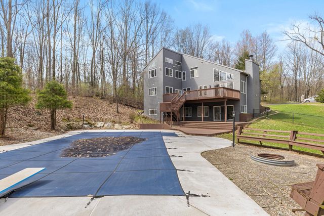 7721 Sun Quest Ridge Drive, Ada, MI 49301