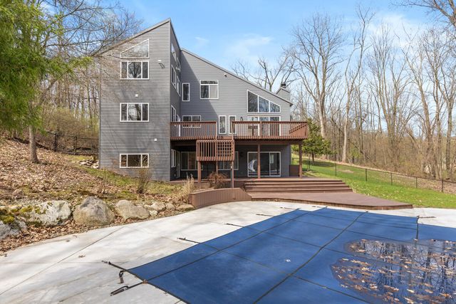 7721 Sun Quest Ridge Drive, Ada, MI 49301