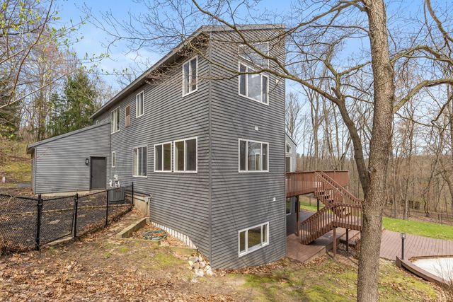 7721 Sun Quest Ridge Drive, Ada, MI 49301