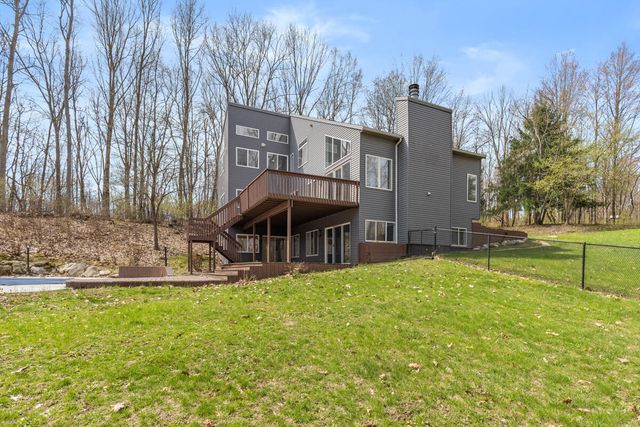 7721 Sun Quest Ridge Drive, Ada, MI 49301