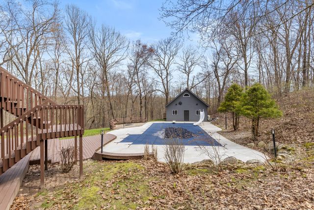 7721 Sun Quest Ridge Drive, Ada, MI 49301