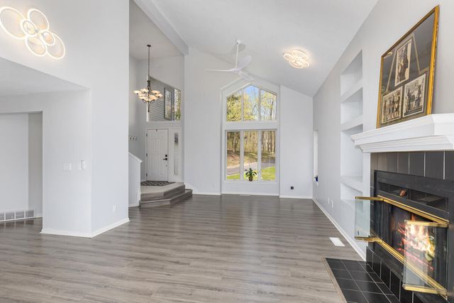 7721 Sun Quest Ridge Drive, Ada, MI 49301