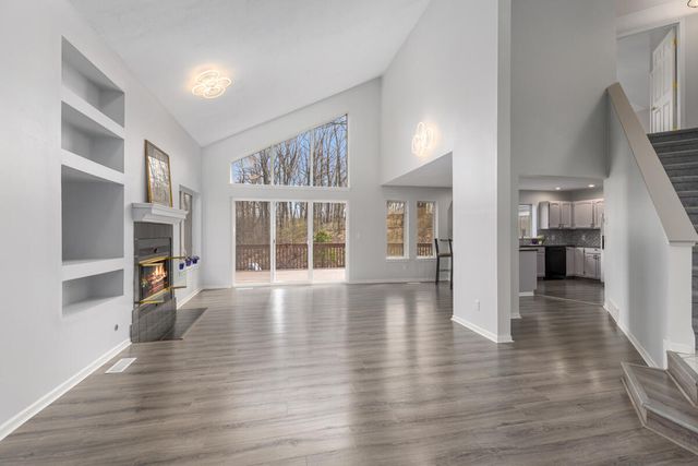 7721 Sun Quest Ridge Drive, Ada, MI 49301