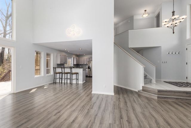 7721 Sun Quest Ridge Drive, Ada, MI 49301