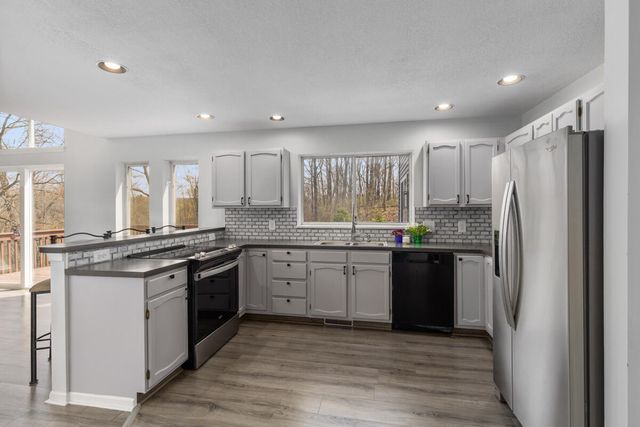 7721 Sun Quest Ridge Drive, Ada, MI 49301