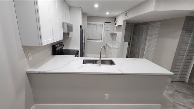 8605 W Sample Road 311, Coral Springs, FL 33065