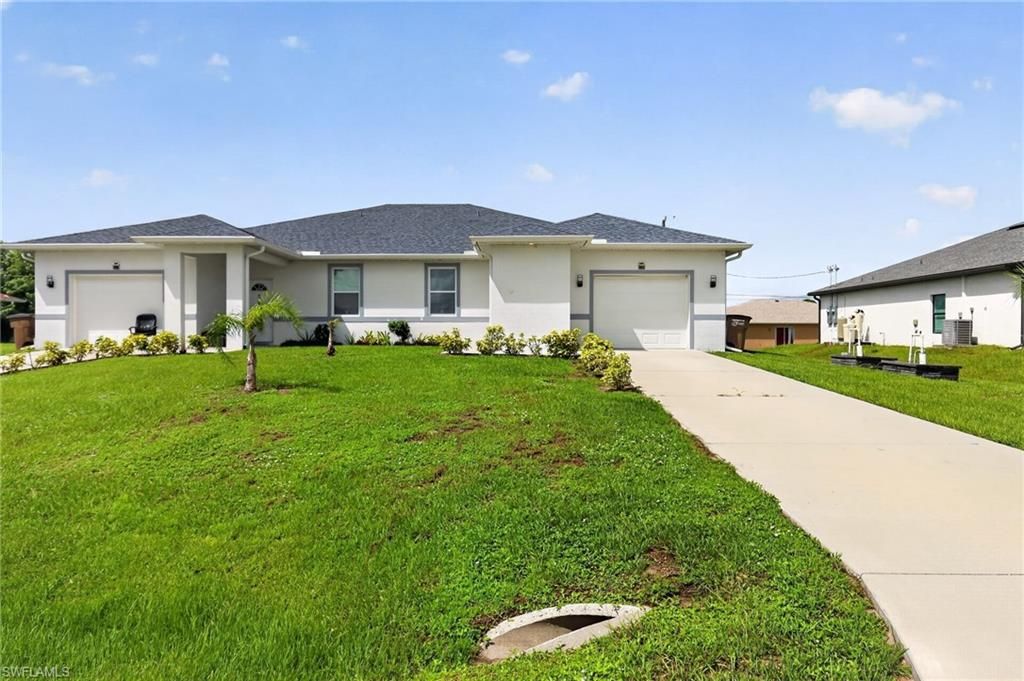 5209/5211 24th ST SW, LEHIGH ACRES, FL 33973 — exterior