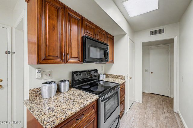 12411 W COUGAR Drive, Sun City West, AZ 85375