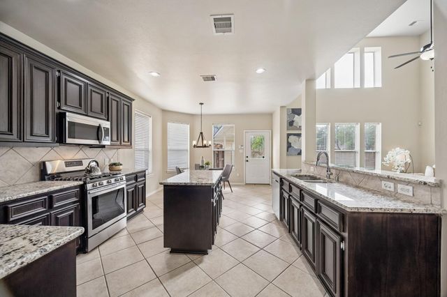 5002 Hearth Hollow Lane, Sugar Land, TX 77479