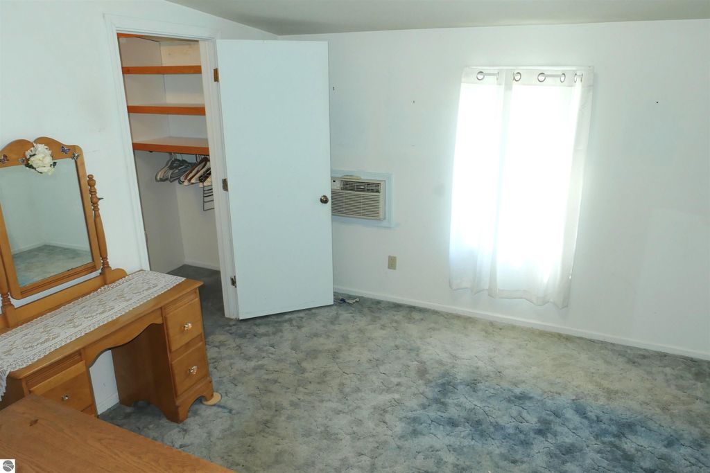 Image 16 of property listing at 1078 Duquesa Drive, Weidman, MI 48893