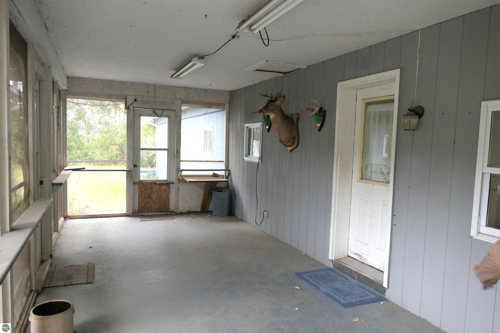 Image 2 of property listing at 1078 Duquesa Drive, Weidman, MI 48893