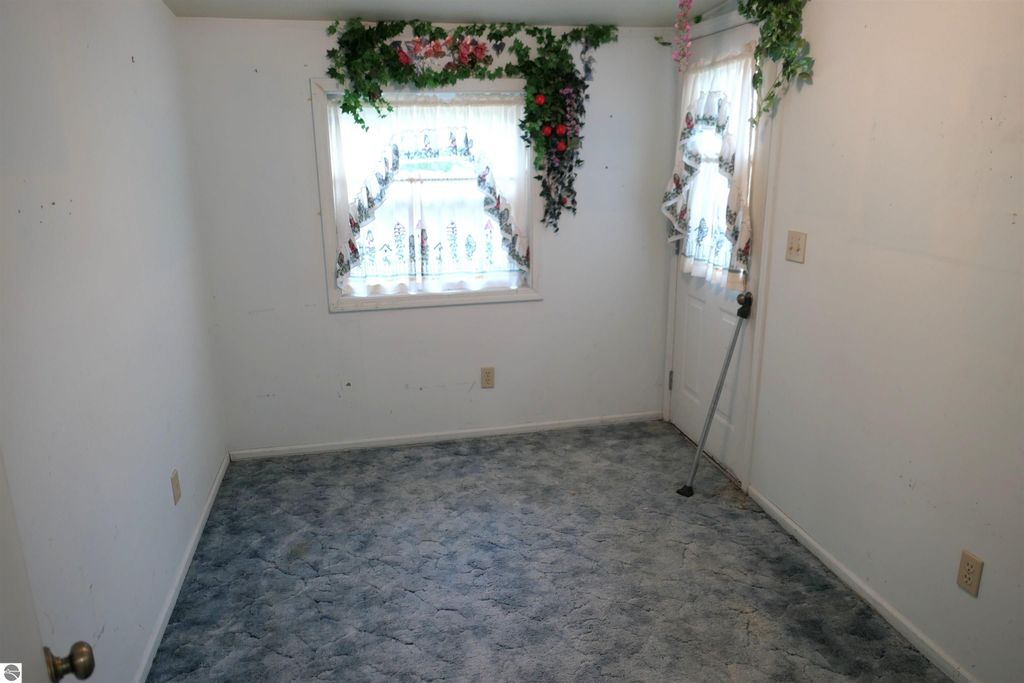 Image 20 of property listing at 1078 Duquesa Drive, Weidman, MI 48893