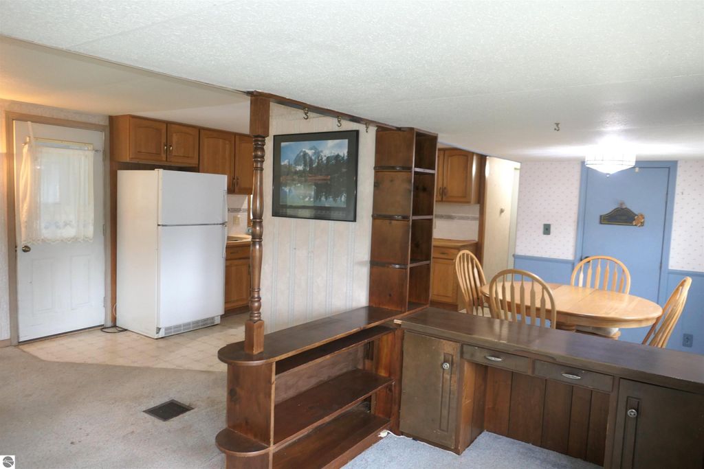 Image 6 of property listing at 1078 Duquesa Drive, Weidman, MI 48893