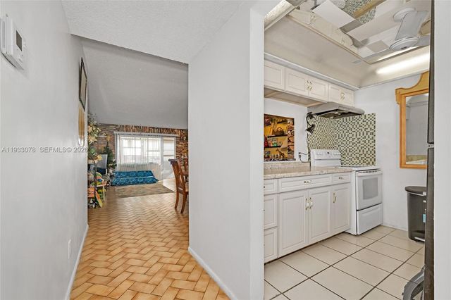 12027 S Greenway Circle 206, Royal Palm Beach, FL 33411