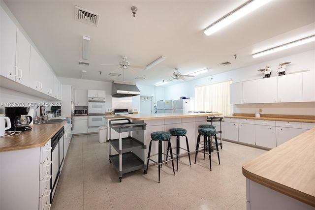 12027 S Greenway Circle 206, Royal Palm Beach, FL 33411