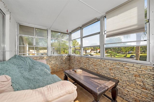12027 S Greenway Circle 206, Royal Palm Beach, FL 33411