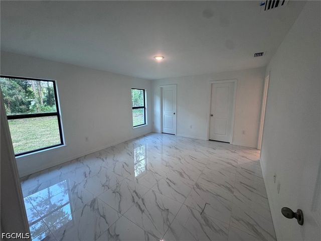 1051 Sentinela BLVD, Lehigh Acres, FL 33974