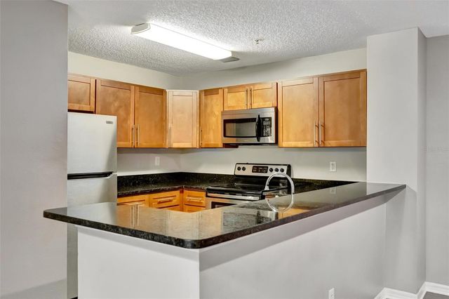 4065 CROCKERS LAKE BOULEVARD 14, Sarasota, FL 34238