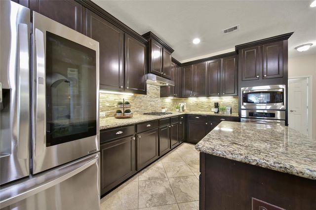 25003 Waterstone Estates Circle N, Tomball, TX 77375