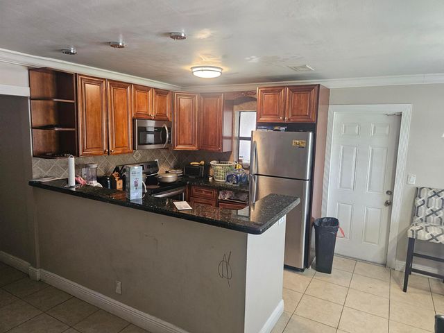 6134 HOGAN CREEK Road, Margate, FL 33063