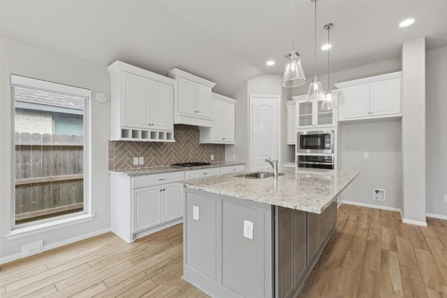 11910 Bazley Knoll Drive, Humble, TX 77346