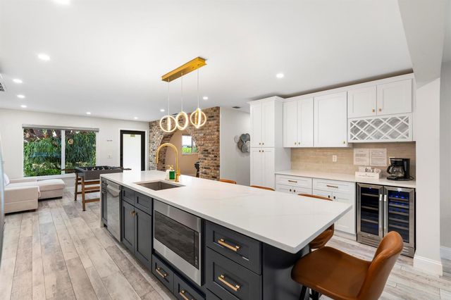 8416 Pine Tree Lane, Lake Clarke Shores, FL 33406