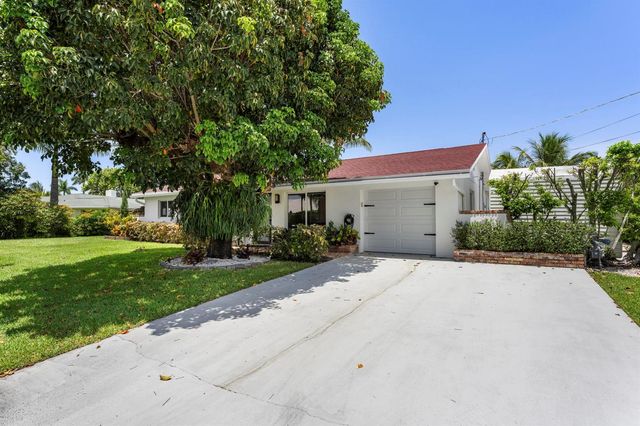 8416 Pine Tree Lane, Lake Clarke Shores, FL 33406