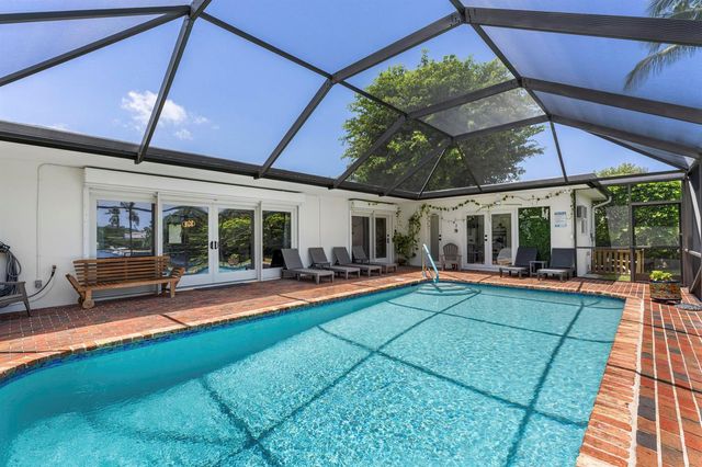 8416 Pine Tree Lane, Lake Clarke Shores, FL 33406