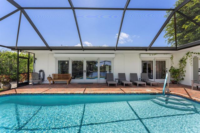 8416 Pine Tree Lane, Lake Clarke Shores, FL 33406