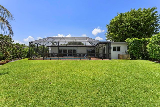 8416 Pine Tree Lane, Lake Clarke Shores, FL 33406