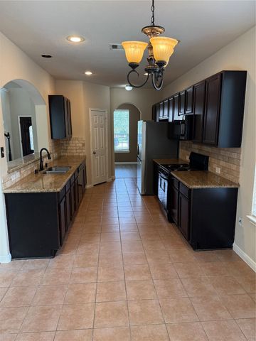 30606 Woodson Trace Drive, Spring, TX 77386