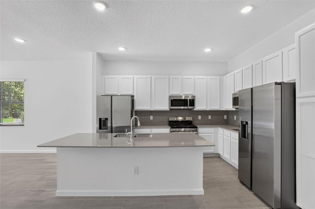 1242 BUTTERFLY ORCHID ROAD, Davenport, FL 33837