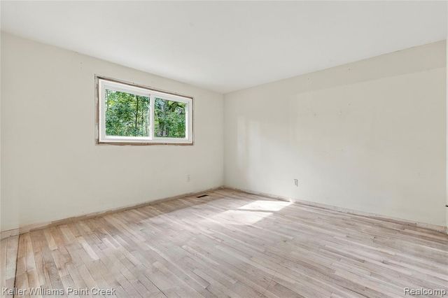 6126 Whispering Oak Drive, Washington, MI 48094