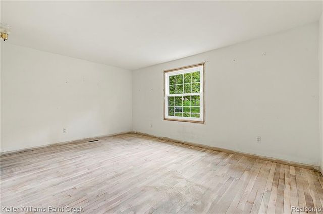6126 Whispering Oak Drive, Washington, MI 48094