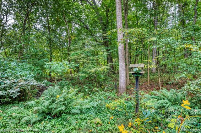 6126 Whispering Oak Drive, Washington, MI 48094