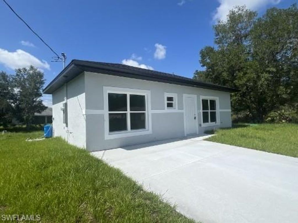706 Azure AVE, LEHIGH ACRES, FL 33974 — photo 2