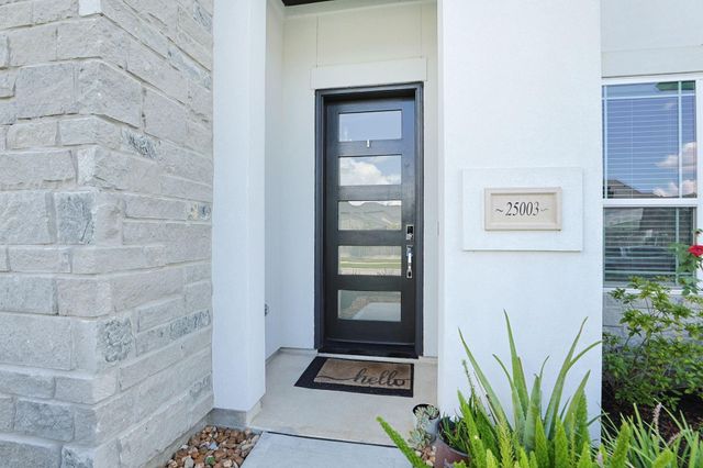 25003 Rainflower Creek Lane, Tomball, TX 77375