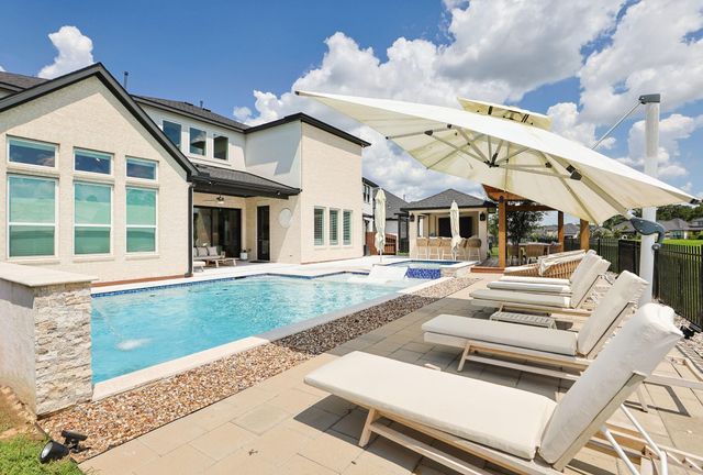25003 Rainflower Creek Lane, Tomball, TX 77375