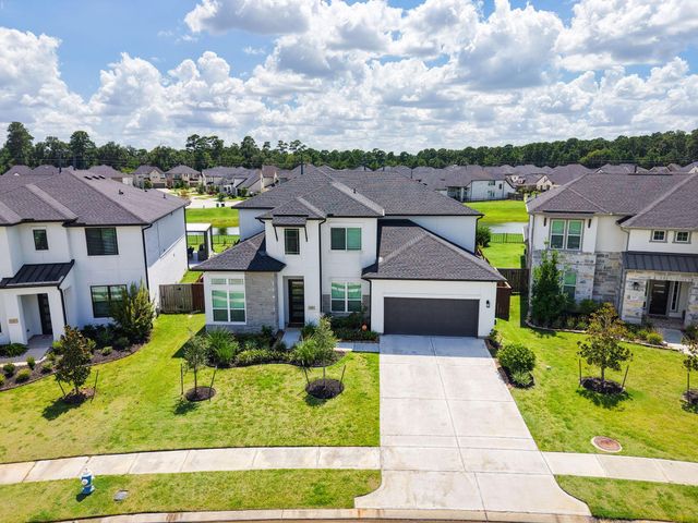 25003 Rainflower Creek Lane, Tomball, TX 77375