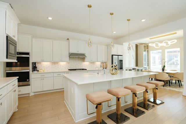 25003 Rainflower Creek Lane, Tomball, TX 77375