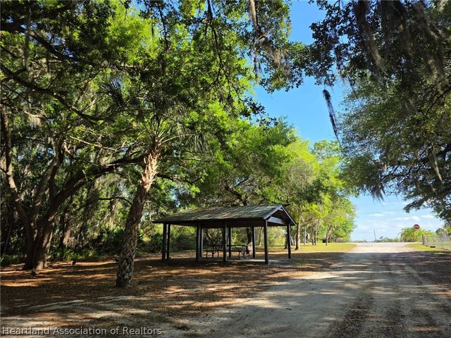 1048 Whispering Oaks Court, Sebring, FL 33875