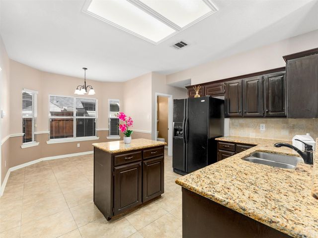 1112 Wild Cherry Drive, Carrollton, TX 75010