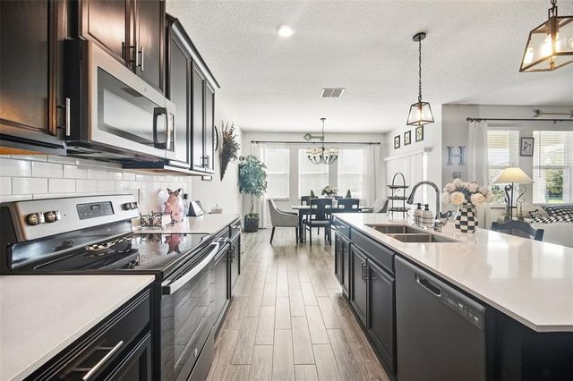 1107 TRAPPERS TRAIL LOOP, Davenport, FL 33896