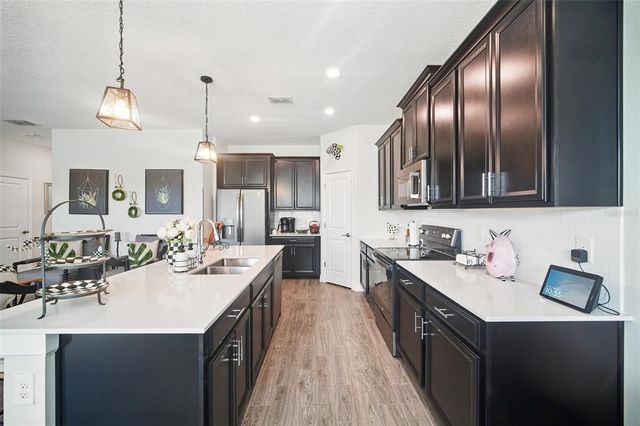 1107 TRAPPERS TRAIL LOOP, Davenport, FL 33896