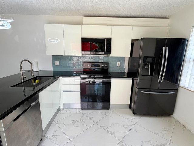 8161 Andover Court 61d, Lake Clarke Shores, FL 33406