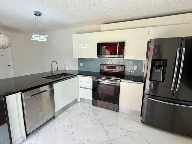 8161 Andover Court 61d, Lake Clarke Shores, FL 33406