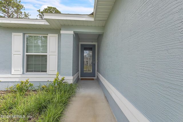 63 PRESIDENT Lane, Palm Coast, FL 32164