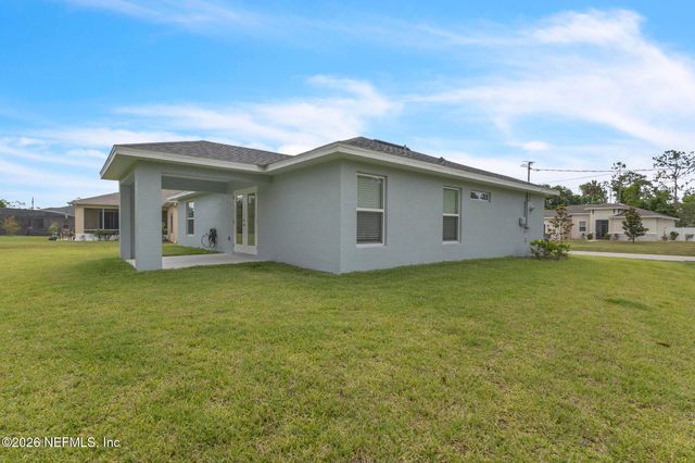 63 PRESIDENT Lane, Palm Coast, FL 32164