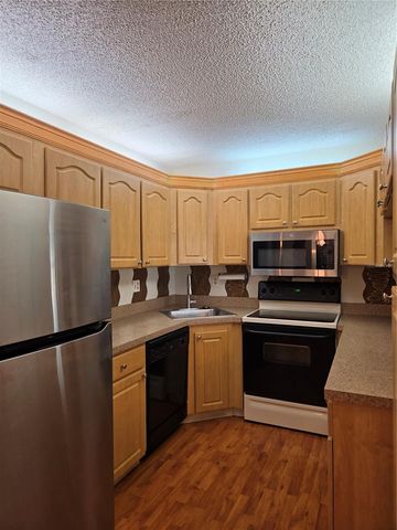 1700 PINE RIDGE WAY E C1, Palm Harbor, FL 34684